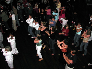 Dancing the Macarena at the Sock Hop (sponsored by the classes of 1974 